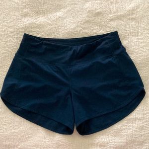 Lululemon Size 6 speed up mid rise shorts. 4 inch inseam, navy blue
